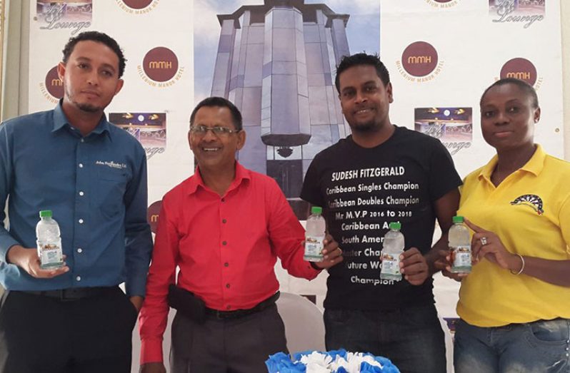 Flashback! GDA president Sheik Yassin (second left) with some of the Guyana players. From left are Luis Ramirez- Merlano, Sudesh Fitzgerald and Shondell Hyles at last week’s launching of the tournament.