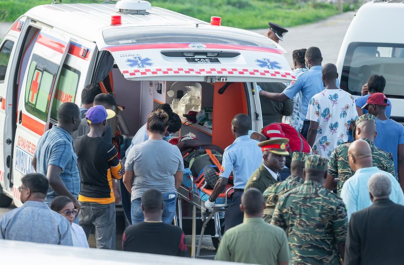 One of the survivors being transported to an ambulance shortly after arriving at the Eugene F. Correia International Airport (Delano Williams Photos)