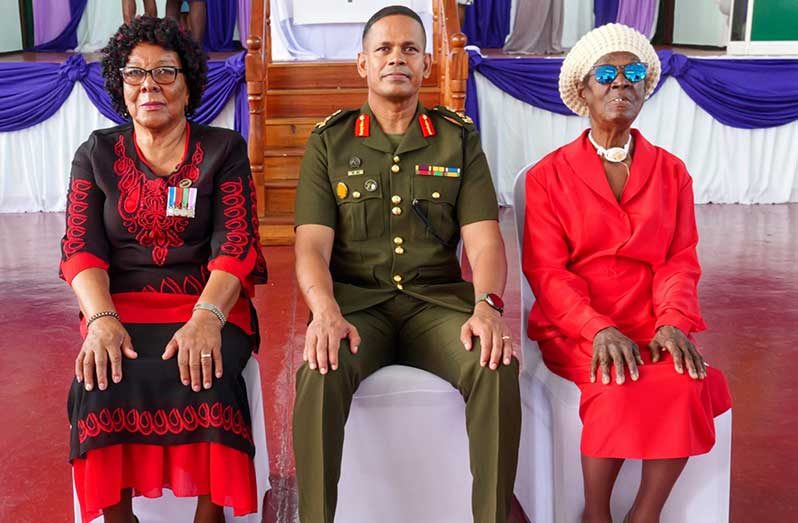 Brigadier Omar Khan is flanked by SSGT (Ret'd) Claudette Croft (left) and SGT (Ret'd) Claudette Thorne (right)