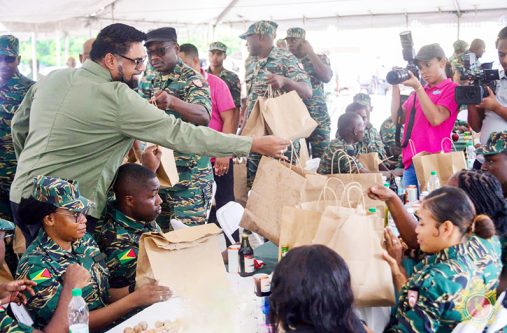 Commander-in-Chief, His Excellency Dr. Mohammed Irfaan Ali shared out the traditional Christmas supplies on Soldiers’ Day as he reminded them of the balance between military discipline and the human connection that underpins the Guyana Defence Force