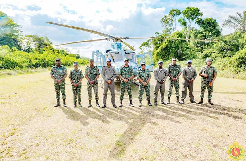 Chief of Defence Staff, Brigadier Omar Khan, MSS (centre) flanked by soldiers during their outreach to underscore the importance of unity, gratitude, and the festive spirit within the Force, ensuring that the season is meaningful for all ranks