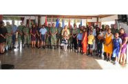 Chief of Defence Staff (CDS), Brigadier Omar Khan (centre) flanked by recently promoted Senior Officers and their proud family members