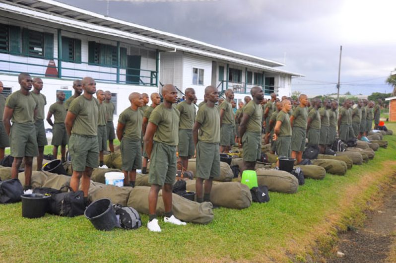 Recruits awaiting instruction before being transported to the training bases