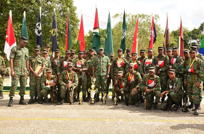 Guyana Defence Force Chief of Staff, Brigadier Patrick West (centre) with the winners at the Final Force Quarterly Fitness (Run and Shoot) Competition