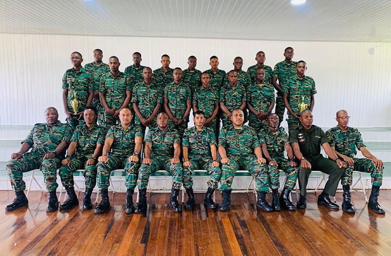 (Seated) Senior GDF officers with one of the two groups that completed the capacity-enhancing skills course