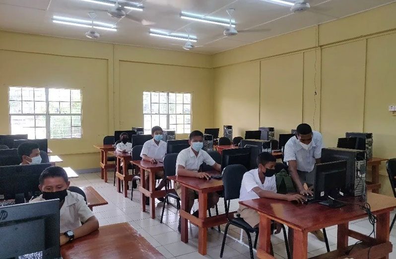 Students of the St. Cuthbert’s Mission Secondary School in their computer laboratory