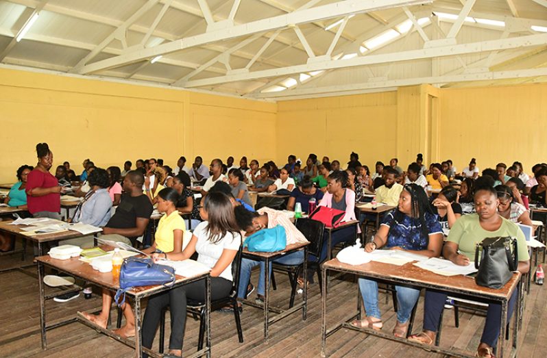 A past photo of potential polling day staff being trained at Lodge Secondary School in Georgetown (Adrian Narine photo)