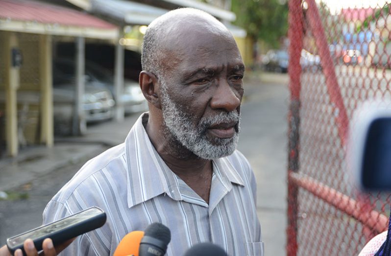 Government-nominated Commissioner, Vincent Alexander speaks to the media (Samuel Maughn photo)