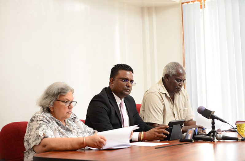 Seated from left are GECOM Commissioners Bibi Shadick, Sase Gunraj and Robeson Benn who assembled at the Office of the Leader of the Opposition, Bharrat Jagdeo (Samuel Maughn photo)