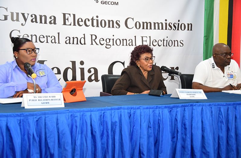 GECOM’s Chair, Justice Claudette Singh is flanked by Chief Elections Officer, Keith Lowenfield and Public Relations Officer, Yolanda Ward at Monday night’s press briefing.