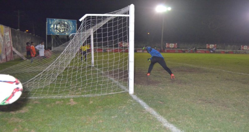 Riddim Squad goalkeeper Ron Liverpool runs off in celebration after successfully blocking a Santos penalty shot.