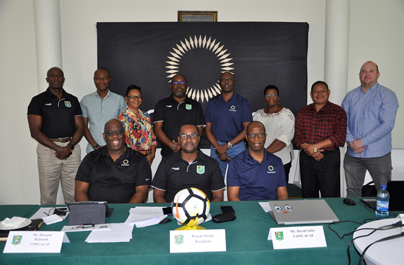 Members of the GFF Executive take time out for a photograph with facilitators Howard McIntosh and David Sabir.
