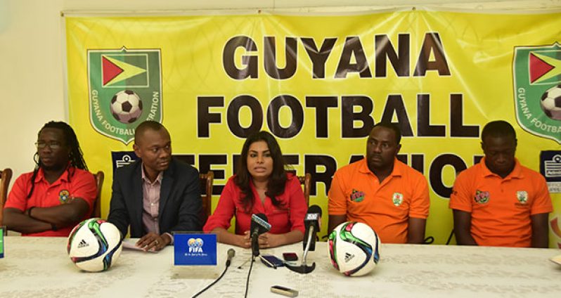Head table at GFF Press briefing yesterday (L-R) Wayne Dover (Alpha United coach), Dion Inniss (GFF executive committee member), Darshanie Yusuf (Ansa McAl), Kavin Pearce (Slingerz asst coach) and Tichard Joseph (captain of Slingerz. (Adrian Narine photo)