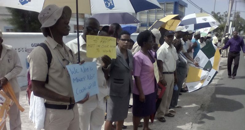 GGMC staff protesting in front of the Commission's Brickdam Office