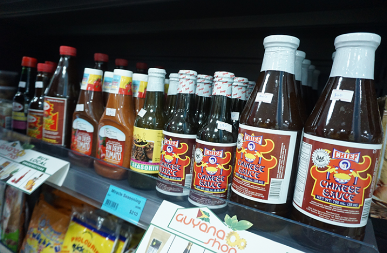 A section of the locally produced agro products in the “IS WE OWN: Guyana Shop” corner (Elvin Croker photo)