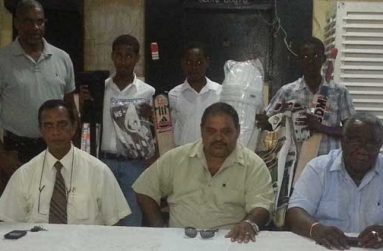 Seated from left are Bishwa Panday, Drubahadur and GNIC Chief Executive Officer Clinton Williams, while standing from left are Clyde Butts, Joshua Persaud, Kurt Lovell and Christopher Campbell, after the presentation was done.