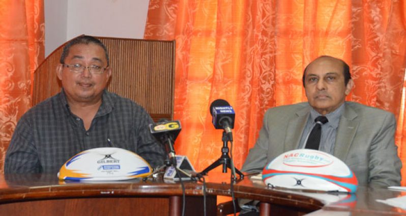 ‘Our financial worries are over and we will focus on preparing the team well!’ This must be what GRFU president Peter Green (left) is saying after hearing of the commitment made by GOA president K. Juman-Yassin at yesterday’s press conference.