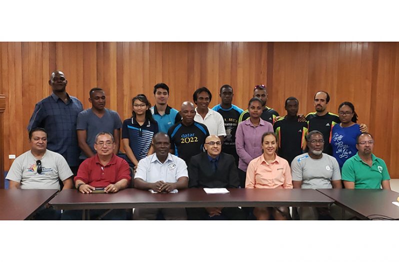 GOA president Juman-Yassin (fourth from left sitting) flanked by officials and some athletes in Guyana’s CAC Games contingent.