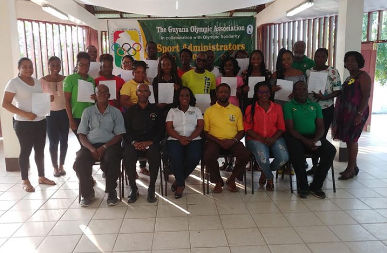Seated from left are GOA representatives Claude Blackmoore, Garfield Wiltshire, Mayor Waneka Arrindell, Charles Corbin, Mayfield Taylor-Trim and Deion Nurse. Standing far right is Wanda Richmond.