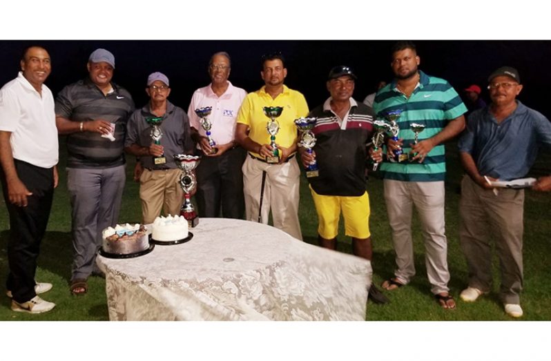 The winners pose with Heineken Managing Director Troy Cadogan, Club President Aleem Hussain and Captain Chatterpaul Deo. L-R: Aleem Hussain, Troy Cadogan, Bholawram Deo, Maurice Solomon, Ayube Subhan, Nazeem Haniff, Richard Haniff and Chatterpaul Deo.