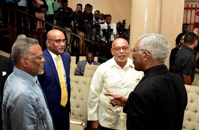 The ‘Gallery of Presidents’, which showcases Guyana’s succession of leaders, was unveiled at the Public Buildings in May 2019. In this photo, President David Granger (right) and (going anti-clockwise) former Presidents Donald Ramotar, Bharrat Jagdeo and Samuel Hinds share a light moment after the ceremony. (Ministry of the Presidency photo)