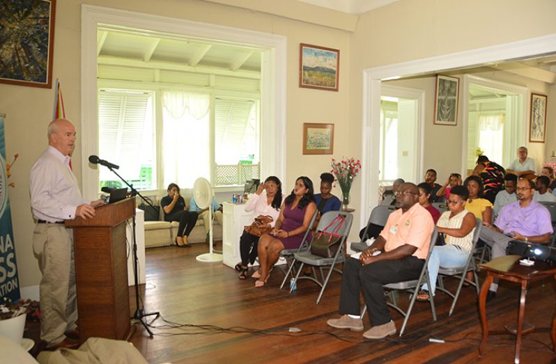Professor Gary Dirks addressing the gathering of media operatives at the Lunch Time Lecture at Moray House Trust (Adrian Narine Photo)
