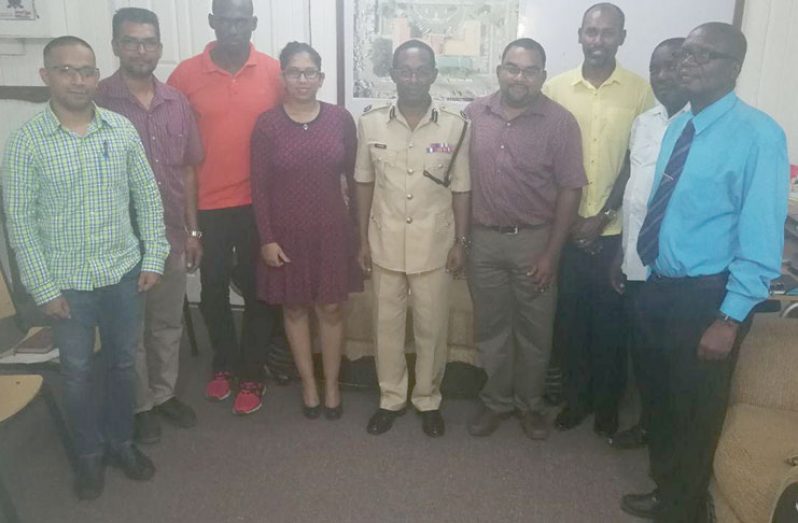(from left) GSSF treasurer, Mr. Ray Beharry; GSSF director, Mr. Aleemul Ali; Mr. Withrithe, OC, TSU; GSSF secretary, Mrs. Vidushi Persaud-McKinnon; Asst. Commissioner of Operations, Mr. Clifton Hicken; GSSF director, Mr. David Dharry; GSSF president, Mr. Ryan McKinnon; Senior Supt. Watt and Senior Supt. Thomasits