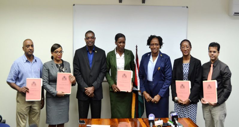 Members of the two boards which fall under the energy sector in a photo-up with Ministers David Patterson and Annette Ferguson soon after receiving their instruments of approval yesterday morning.
