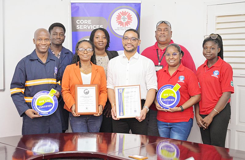 GPL staff pose with the certificate, plaque and stickers issued by the GNBS during the certification ceremony