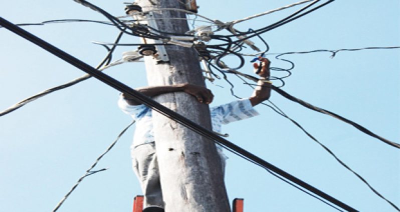 A GPL official severing an illegal connection during one of the company’s many disconnection campaigns