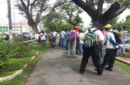 GPL employees protesting outside the company's Main Street, Georgetown office.