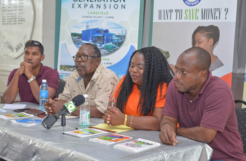 L-R] Senior Transmission and Distribution Engineer (ag) Rovindranaugt Jagnanan; Customer Service personnel, Alicia Williams and employee within the Projects Department, Frank John