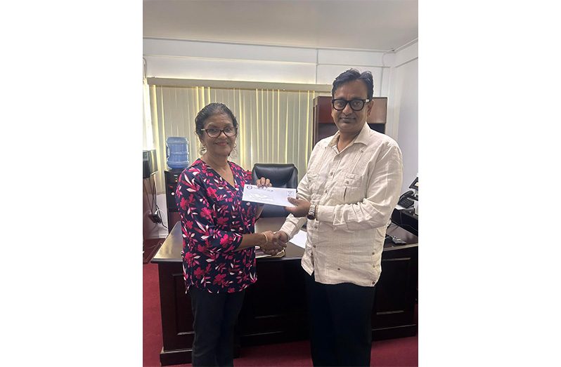 The donation was formally presented by GPL Team Leader Kesh Nandlall and accepted by Guyana Hindu Dharmic Sabha Executive Member, Savitri Sukhai