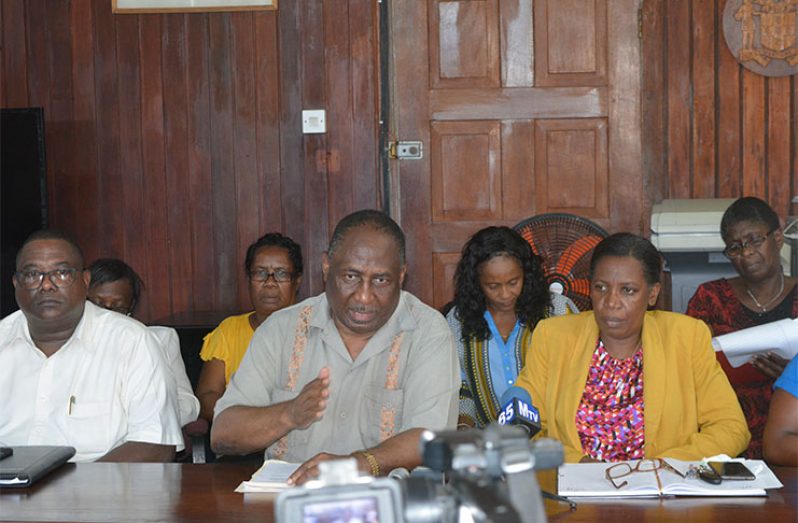 President of The Guyana Public Service Union Patrick Yarde (center)