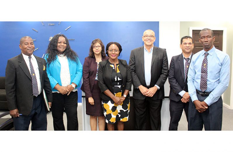 Deputy Director of the World Customs Organisation, Brenda Mundia (centre) with Commissioner General, Godfrey Statia and other senior GRA representatives