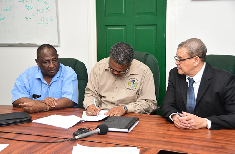 President of GPSU, Patrick Yarde; Chief Labour Officer, Charles Ogle; and Commissioner-General of GRA, Godfrey Statia (Adrian Narine photo)