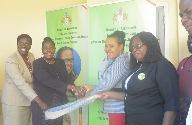 At the handing over on Monday are, from left: MoA Permanent Secretary, Delma Nedd; Minister in the Ministry of Agriculture, Valerie Adams-Yearwood; Regional Executive Officer (REO) Pauline Lucas; and Regional Chairman, Genevieve Allen