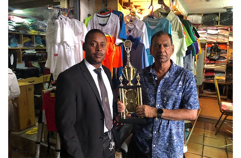 GRFU’s PRO, Godfrey Broomes and Ramesh Sunich (right) of Trophy Stall yesterday.