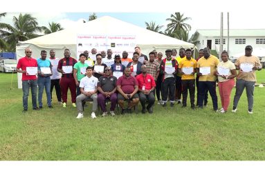 Seated right to left- Raydon Krammer, Petra Scholarship awardee; Jamaal Shabazz, Former Golden Jaguars Head Coach; Petra Director Troy Mendonca and Orette Francois, Ministry of Human Services,  flanked by participants of the workshop