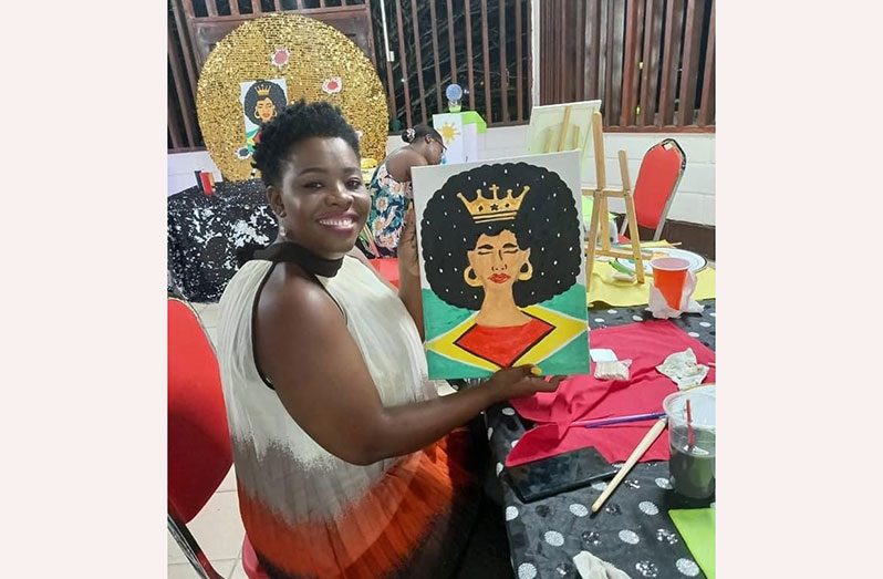 Mayor of Linden, Waneka Arrindell, displays her painting at the event