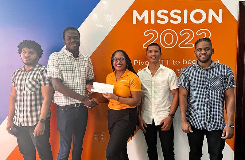 Senior Manager, PR and Corporate Communications, Jasmin Harris (centre), with members for team Frameperfect (left to right): Malik Williams, Andrew Garnett, Jun Leung and Shomari Williams