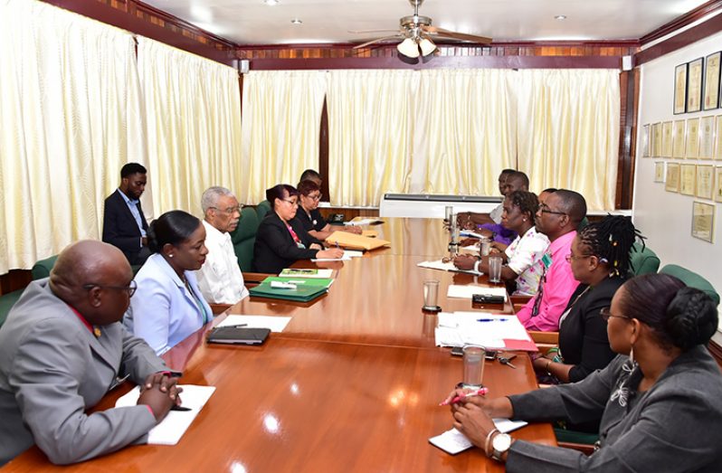 President David Granger, seated third from left and Minister of Education, Nicolette Henry (at the President's right) during a meeting with officials of the Ministry of Education and the Guyana Teachers Union. (Ministry of the Presidency photo)