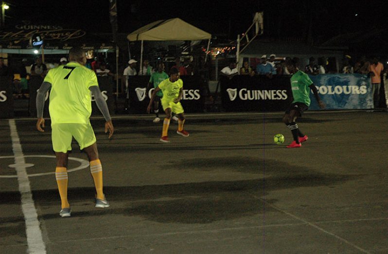 Action on Friday night in the Guinness ‘Greatest of the Streets’ West Demerara Zone