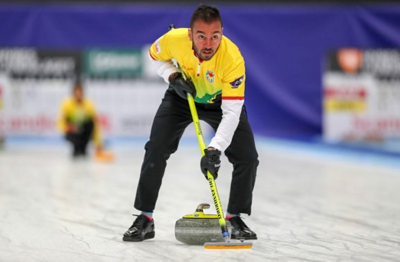 Rayad Hussain and Farzana Hussain in action against Brazil at the World Mixed Curling Championship in Sweden