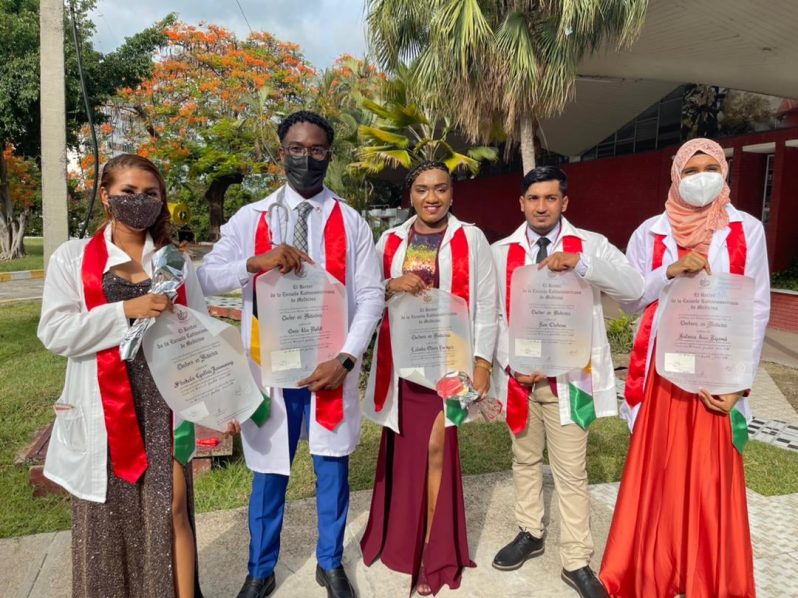 The five newly graduated medical doctors with the certificates. From left are: Dr. Shekeila Ramsammy, Dr. Omar Moffett, Dr. Latesha Fordyce, Dr. Ron Chetram and Dr. Rafeena Riyasat