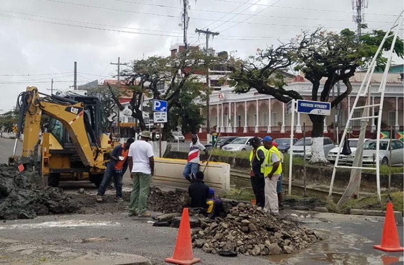 The pipe works ongoing at the intersection of Church Street and Avenue of the Republic in Georgetown (Paul McAdam photo)