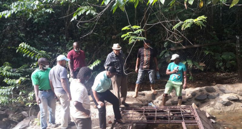 GWI CEO and GWI Senior Managers examining sections of the Mahdia water supply system.