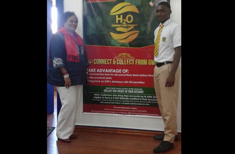 Local actress Ms Desiree Edghill and the QC student who will feature in the television advertisement in the GWI Christmas promotion