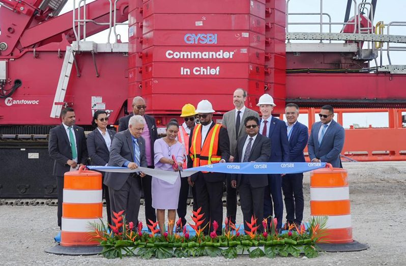 The ceremonial ribbon being cut to officially commission two heavy-lift berths and the ‘Commander-in-Chief’ crane at the Guyana Shore Base Inc (GYSBI) Houston, East Bank Demerara facility (Office of the President photos)