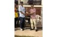 Man-of-the-match in the winning team, Lalta Gainda, receives his award from Frederick Halley